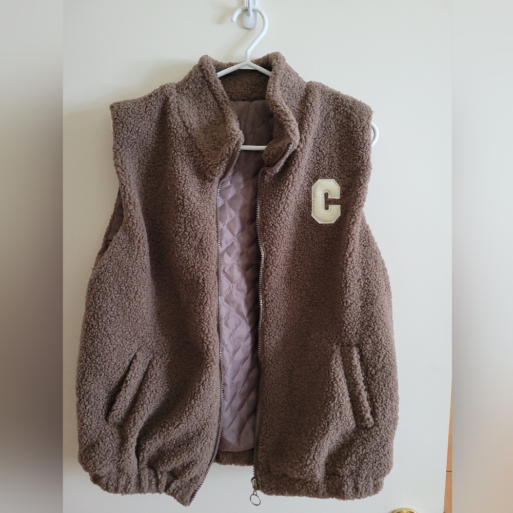New Sleeveless blazer